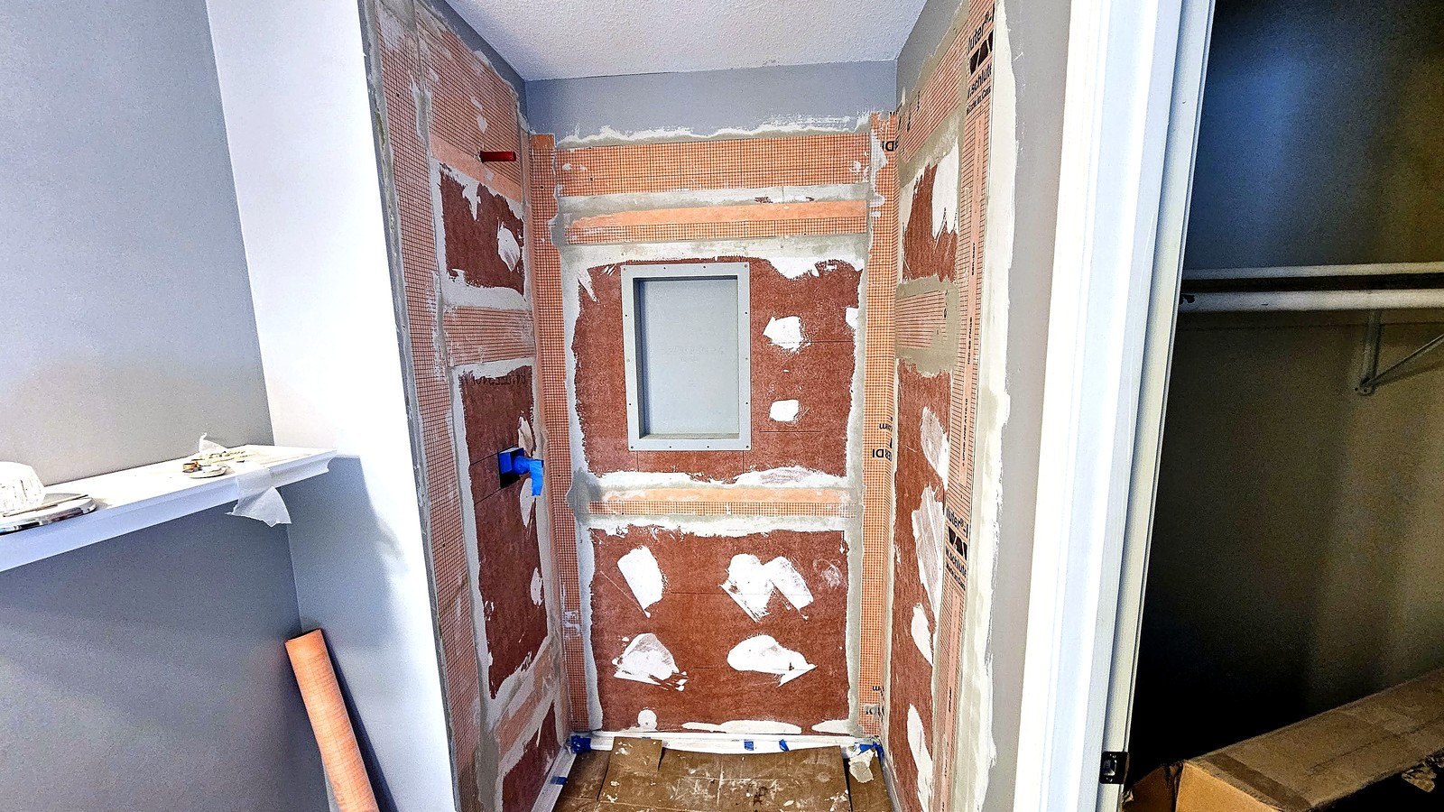 waterproofing membrane installed in Kansas City shower remodel Schluter Kerdi